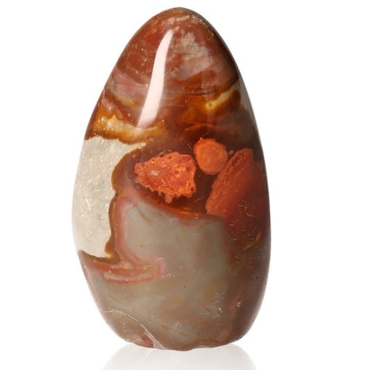 Polychrome Jasper Free Form stone with vibrant red, orange, and brown patterns, known for grounding and energizing properties.