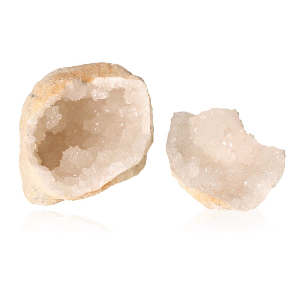 Milky quartz geode with a rugged exterior and sparkling cloudy white crystals, ideal for enhancing tranquility and balancing energy.