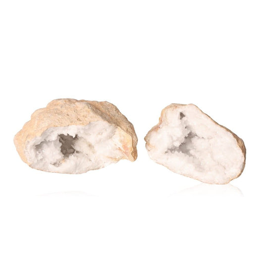 Milky quartz geode with rugged shell and sparkling white crystals promotes tranquility and clarity, perfect for energy balance.