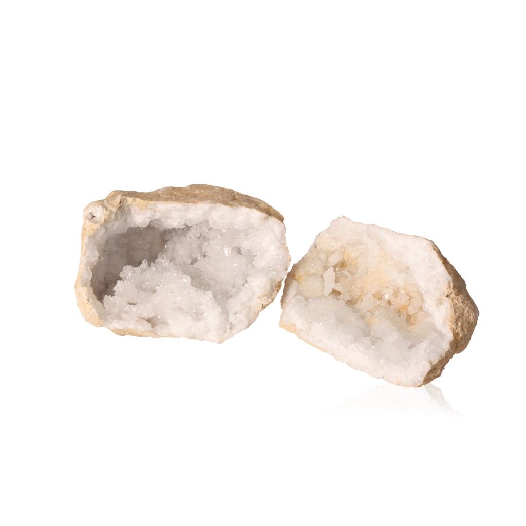 Open milky quartz geode with sparkling white crystals inside, promoting tranquility and cleansing energy.