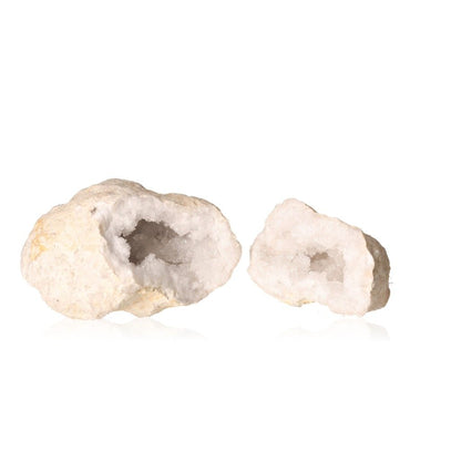 Quartz geode with an earthy shell and sparkling white crystals, known for energy purification and enhancing focus and positivity.