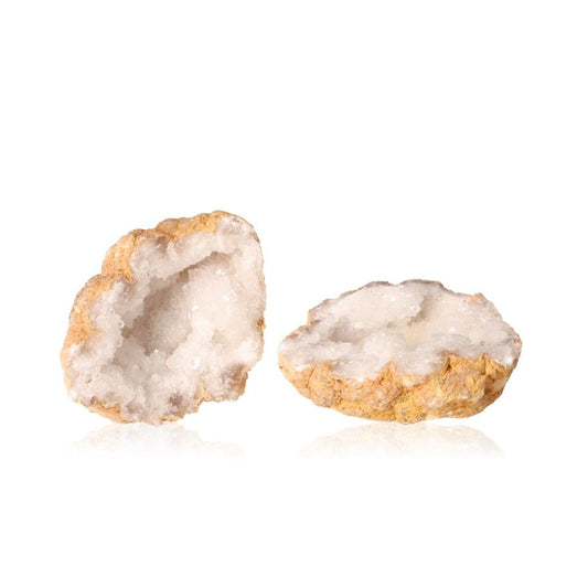 Milky quartz geode pair with earthy shell and sparkling white crystals, ideal for energy balance and focus enhancement.