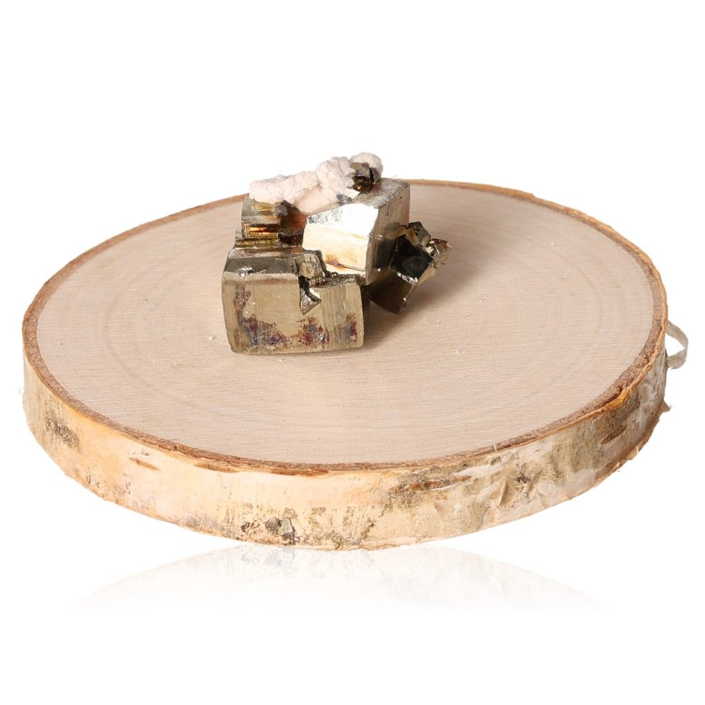 Pyrite druzy on wooden slice, promoting mental independence and motivation for new ideas and initiative.