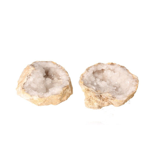 Milky quartz geodes with sparkling white crystals, known for purifying energy and enhancing tranquility, perfect for focus and positivity.