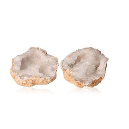 Milky quartz geode with sparkling white crystals, enhancing energy balance and focus.