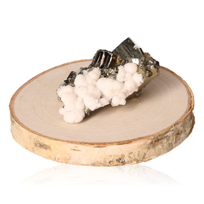 Pyrite druzy on a wooden base, showcasing its metallic and white crystalline formations for inspiration and motivation.