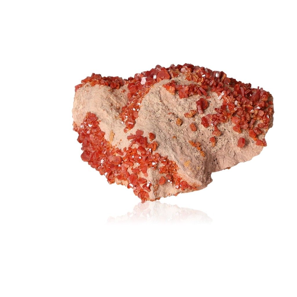 Vanadinite druze crystal cluster boosting focus, motivation, and personal transformation on a white background.