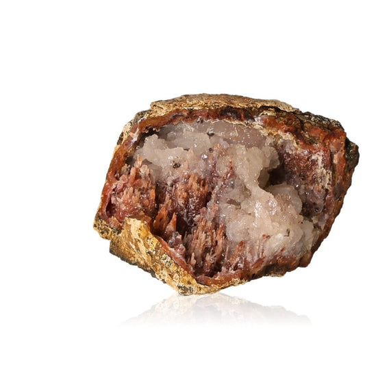 Calcite stalactite showcasing earthy tones and intricate layered structure, symbolizing growth and grounding energy.