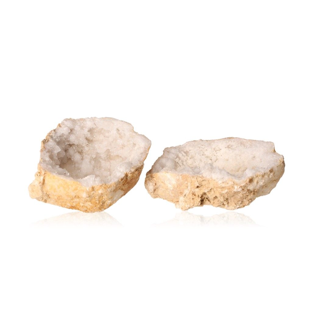 Milky quartz geode with rugged shell revealing sparkling white crystals, perfect for enhancing tranquility and energy balance.