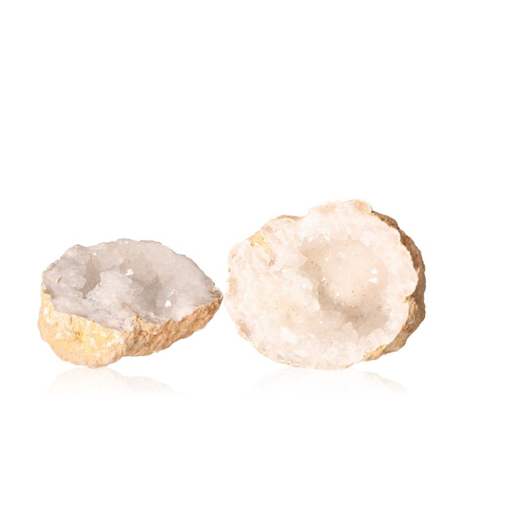 Milky quartz geodes with sparkling white crystals, known for energy cleansing and boosting focus, 700-900g.