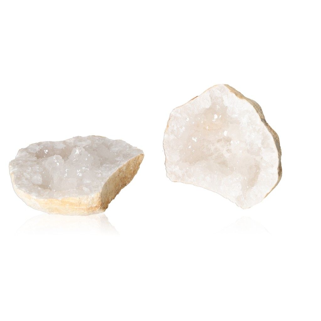 Milky quartz geodes with rugged shell and sparkling crystals for energy balance and tranquility.