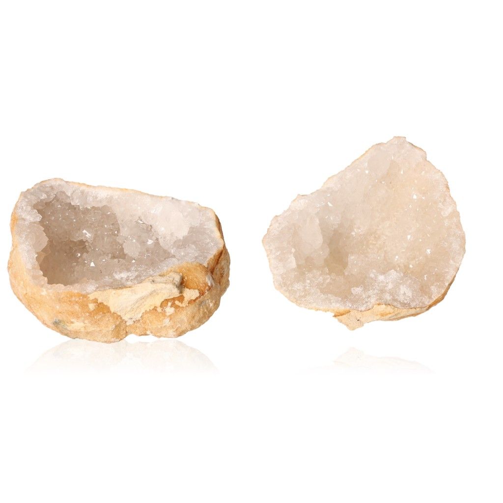 Milky quartz geodes showcasing rugged exterior with sparkling white crystals, ideal for energy balance and promoting tranquility.