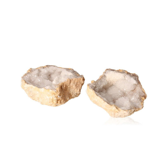 Sparkling milky quartz geode open to reveal cloudy white crystals, perfect for enhancing tranquility and purifying energy.