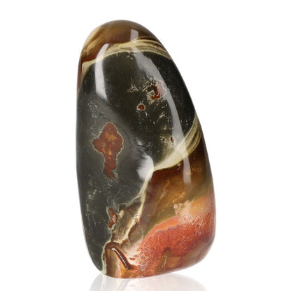 Polychrome Jasper free form with vibrant red, orange, and brown patterns known for its grounding and energizing properties.