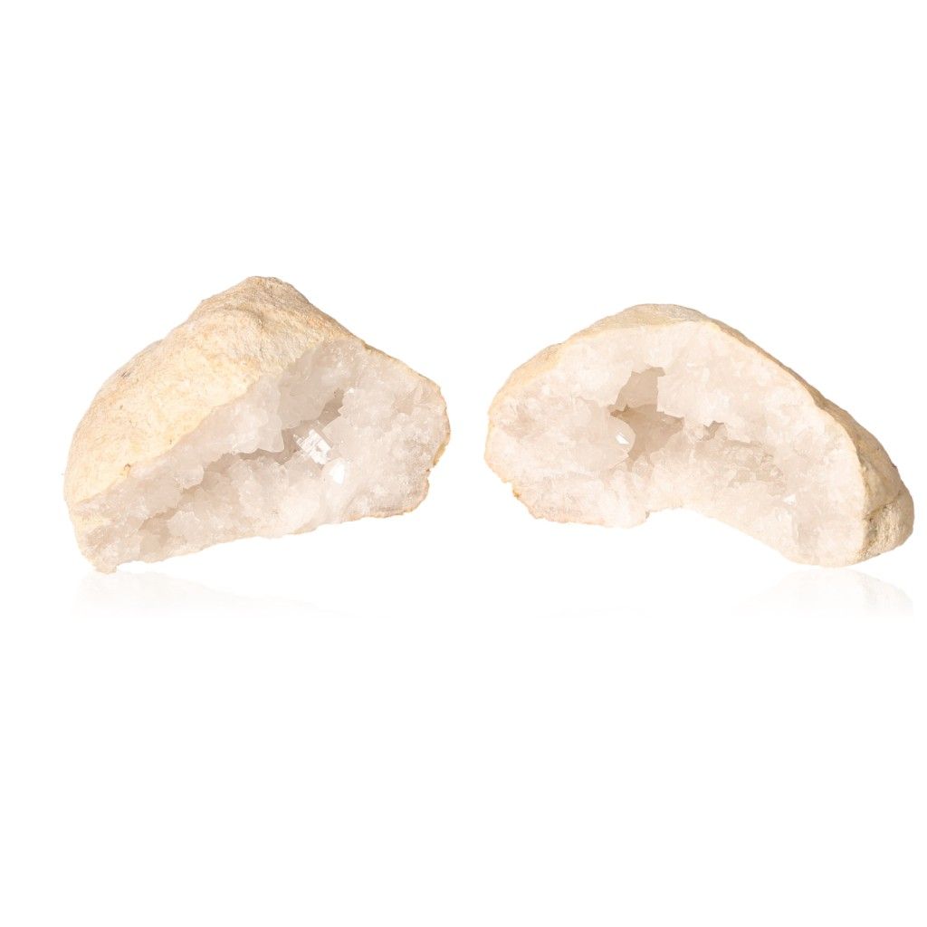 Milky quartz geodes with sparkling white crystals, rugged outer shell, perfect for enhancing tranquility and positive energy vibes.