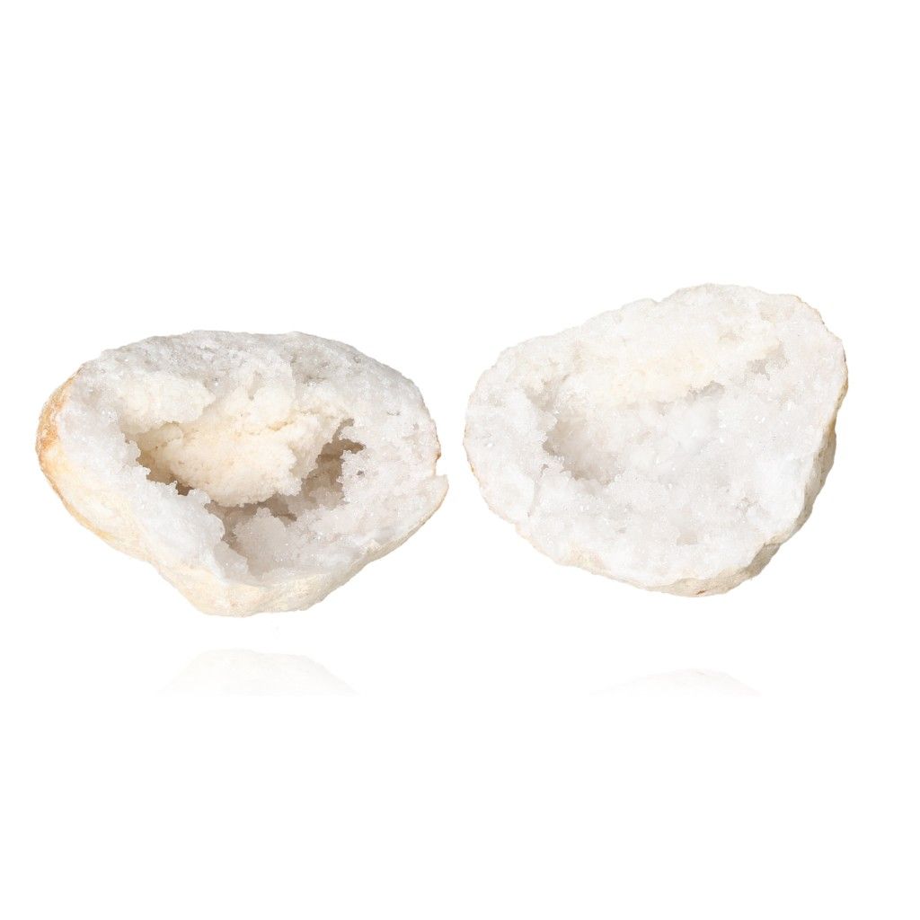 Milky quartz geode split open, showcasing sparkling white crystals inside, perfect for enhancing tranquility and balancing energy.