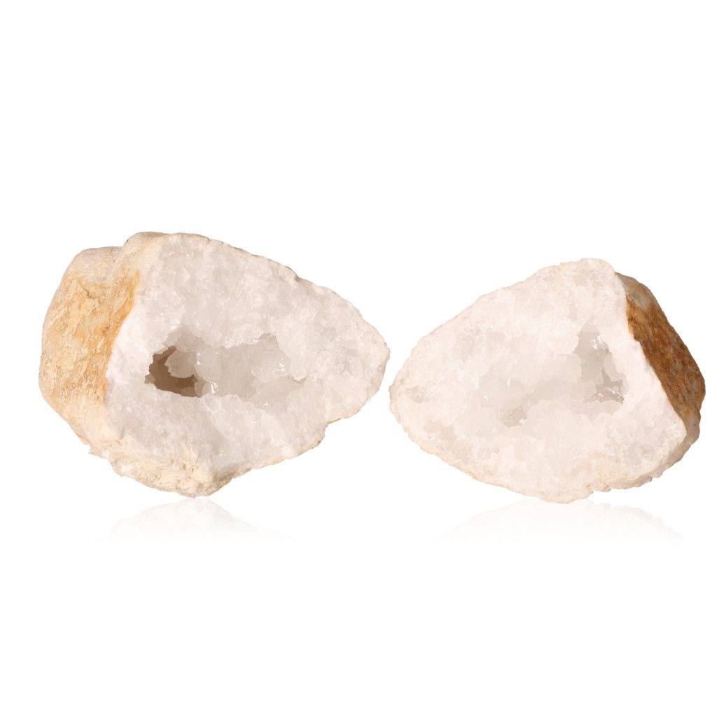 Milky quartz geode showcasing sparkling white crystals and earthy shell, known for energy purification and promoting tranquility.